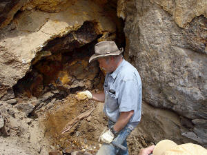 Gene checking out the seam he just hammered out.