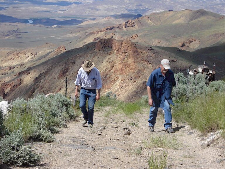 Gene and I walking up after taking a look at the road below