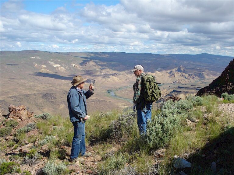 Gene pointing out the boundary between Jake's Place Claim and the Veronica Lee Claim.