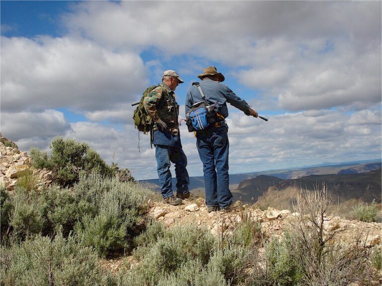 Gene pointing out the boundary between Jake's Place Claim and the Veronica Lee Claim.